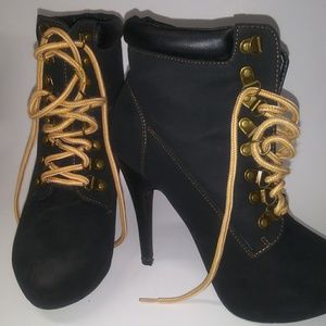 Slightly worn heel boots